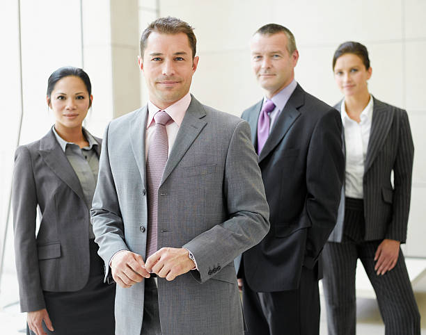 Presentation, coaching and training with a leader, manager or CEO teaching in a workshop, seminar or meeting in the boardroom. Education, leadership and mentor with a business man in marketing