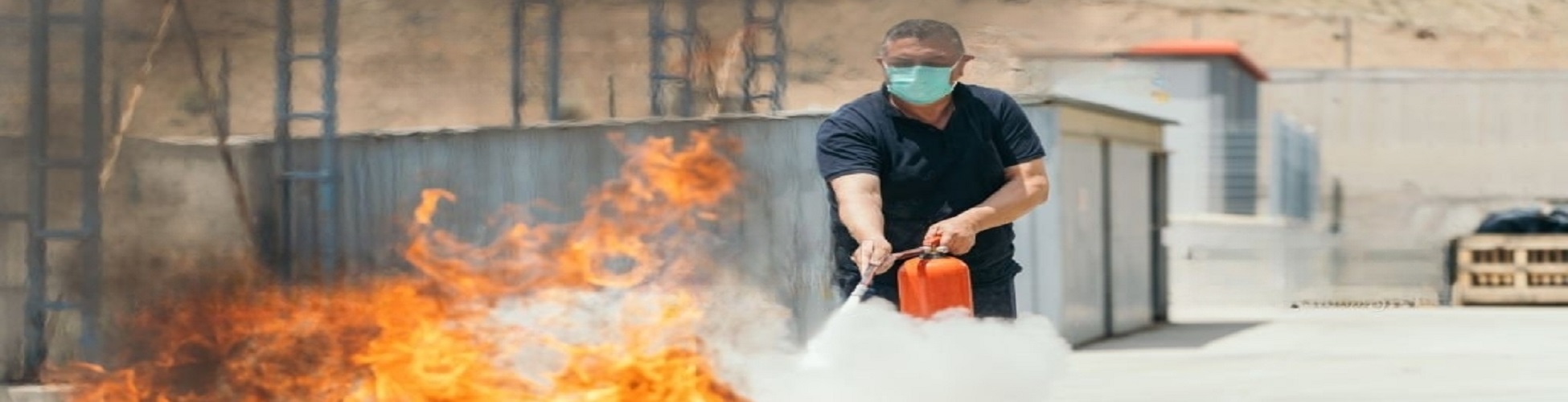 A man showing how to use fire extinguisher isolated over white background