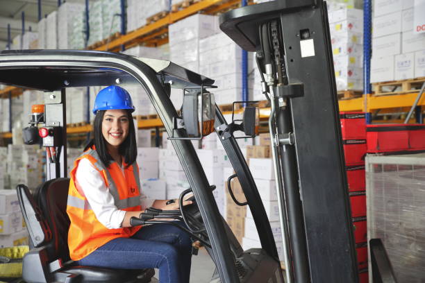 forklift driver in a warehouse for industrial goods